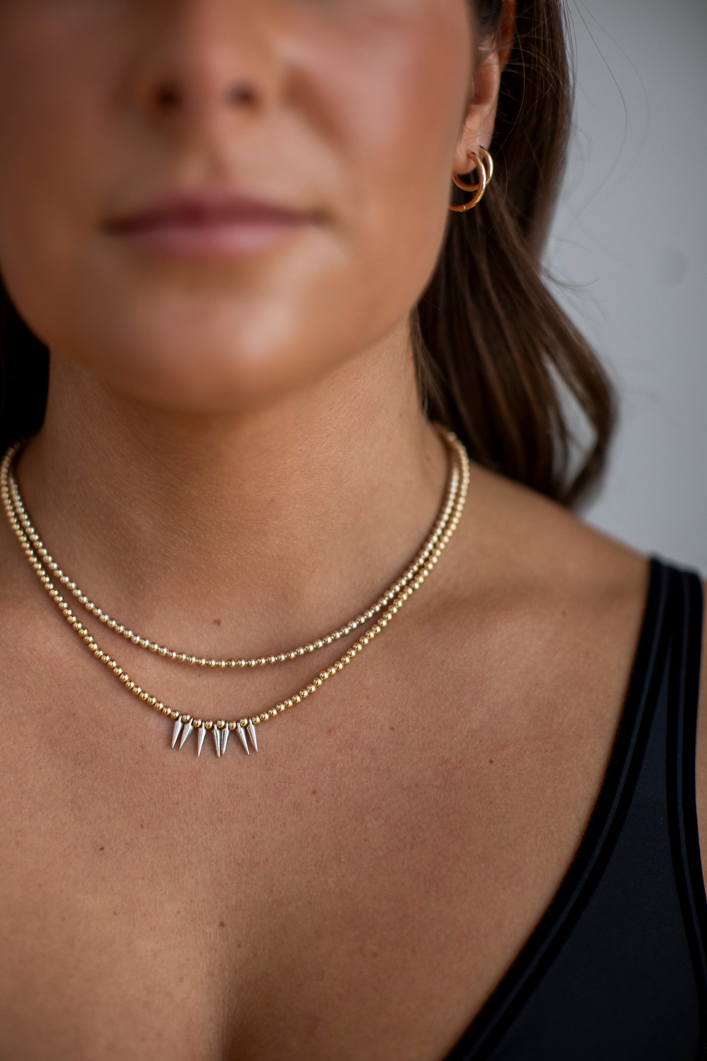Gold with silver spike necklace