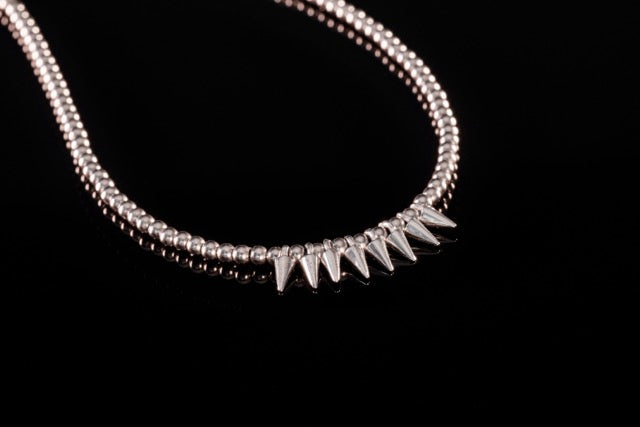 Gold with silver spike necklace