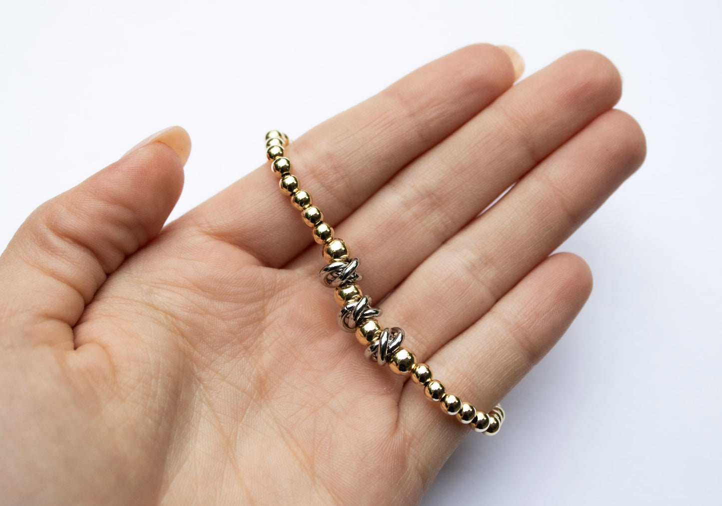 Gold bead with silver knots Bracelet