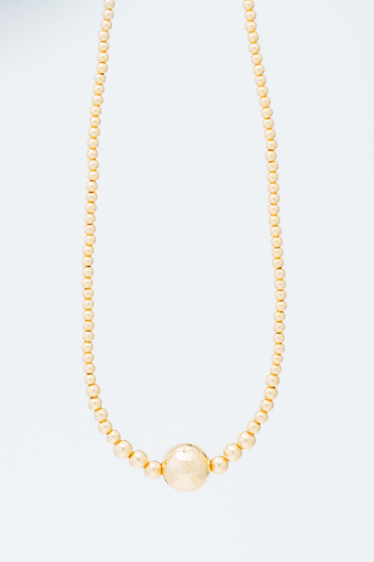 Gold large bead necklace