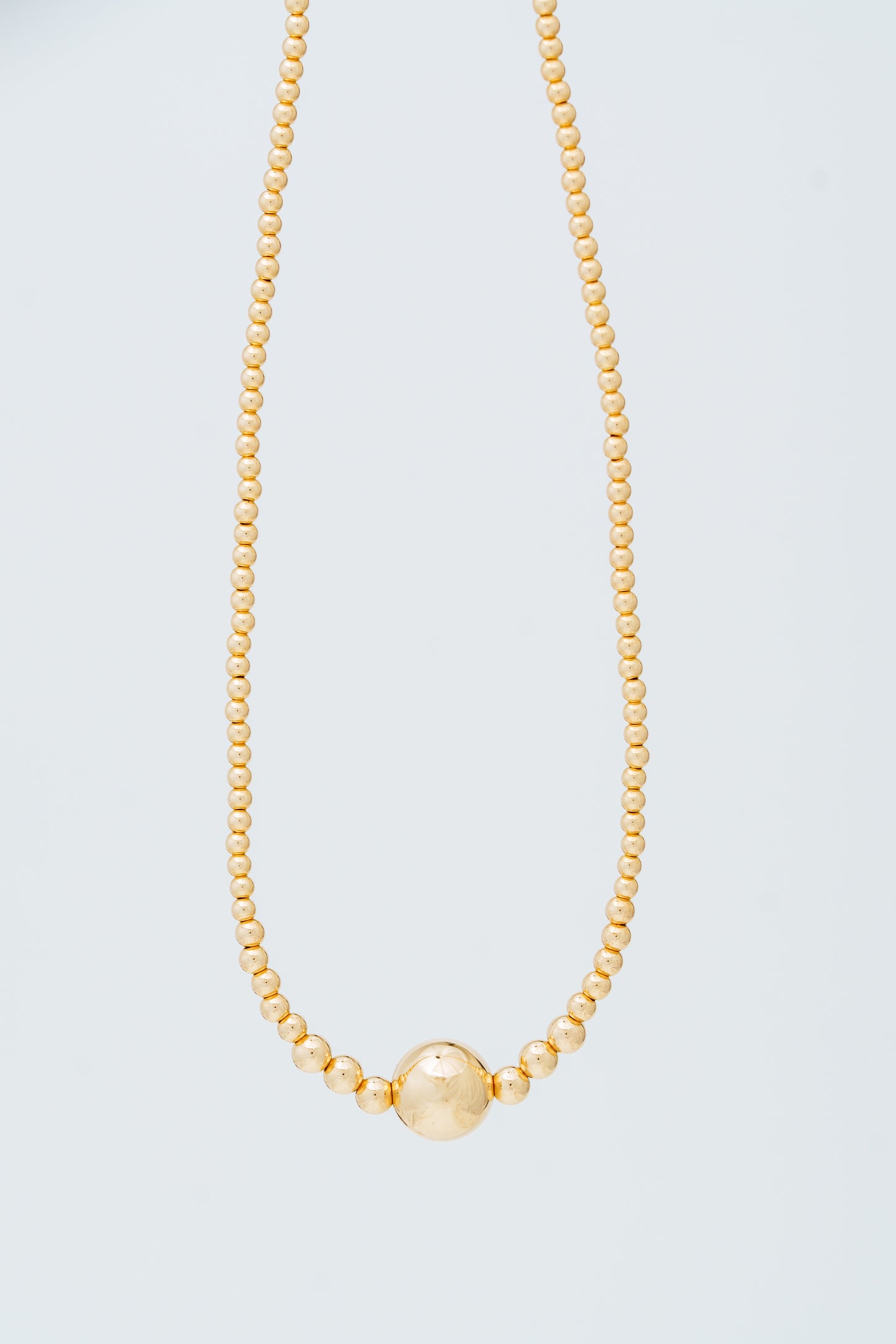 Gold large bead necklace